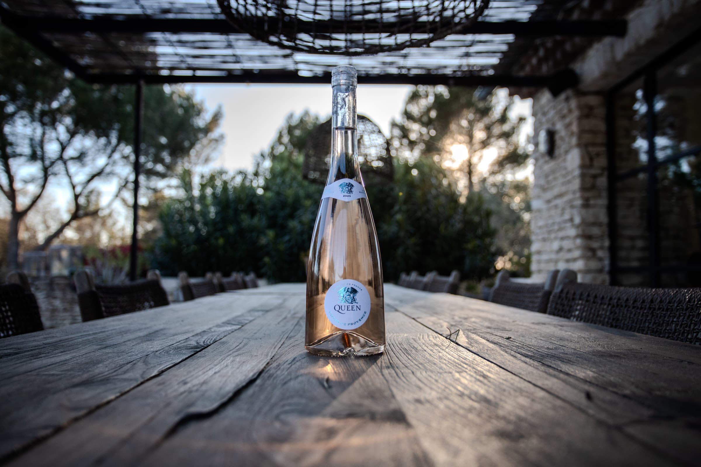 Queen Côtes De Provence Rosé bottle at sunset